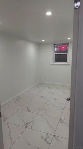 70-51 45th Avenue, Woodside, NY 11377