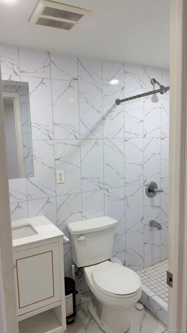 70-51 45th Avenue, Woodside, NY 11377