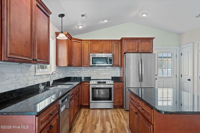 208 NE 52nd Street, Oak Island, NC 28465