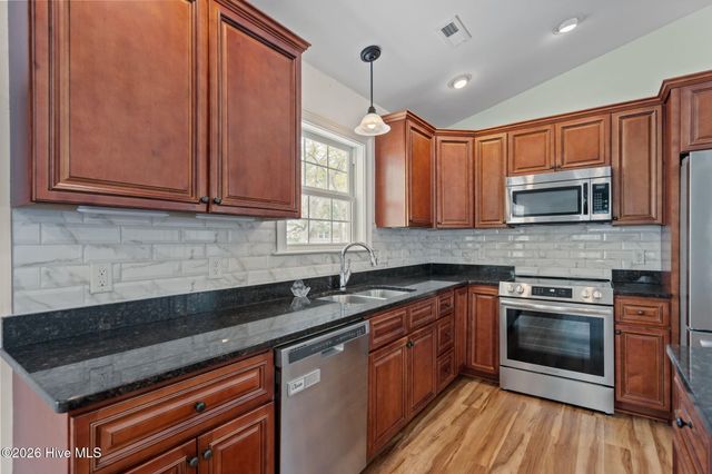 208 NE 52nd Street, Oak Island, NC 28465