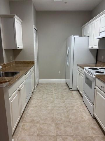 303 SOUTHERN PECAN CIRCLE 107, Winter Garden, FL 34787