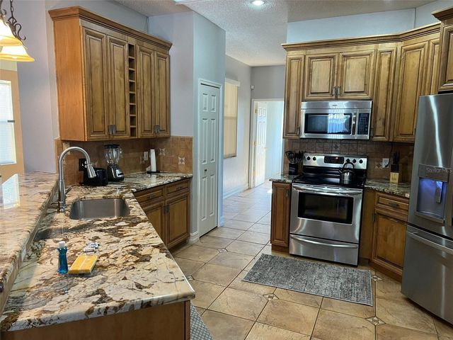 413 MARLBERRY LEAF AVENUE, Kissimmee, FL 34758