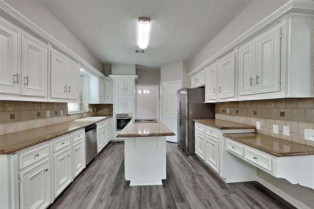 8015 Democracy Court, Spring, TX 77379
