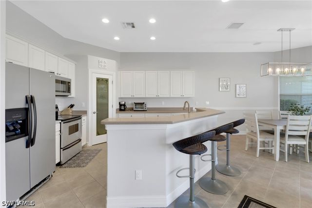 6757 Bent Grass DR, Naples, FL 34113