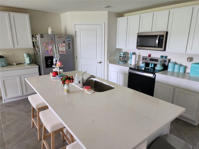 3234 EVENMORE WAY, Wildwood, FL 34785