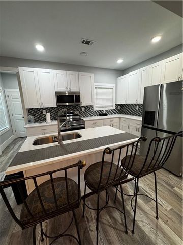 3898 KING ARTHUR SW Road, Atlanta, GA 30331