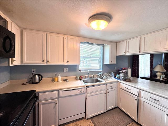 6008 AMBERLY AVENUE F63, Orlando, FL 32822