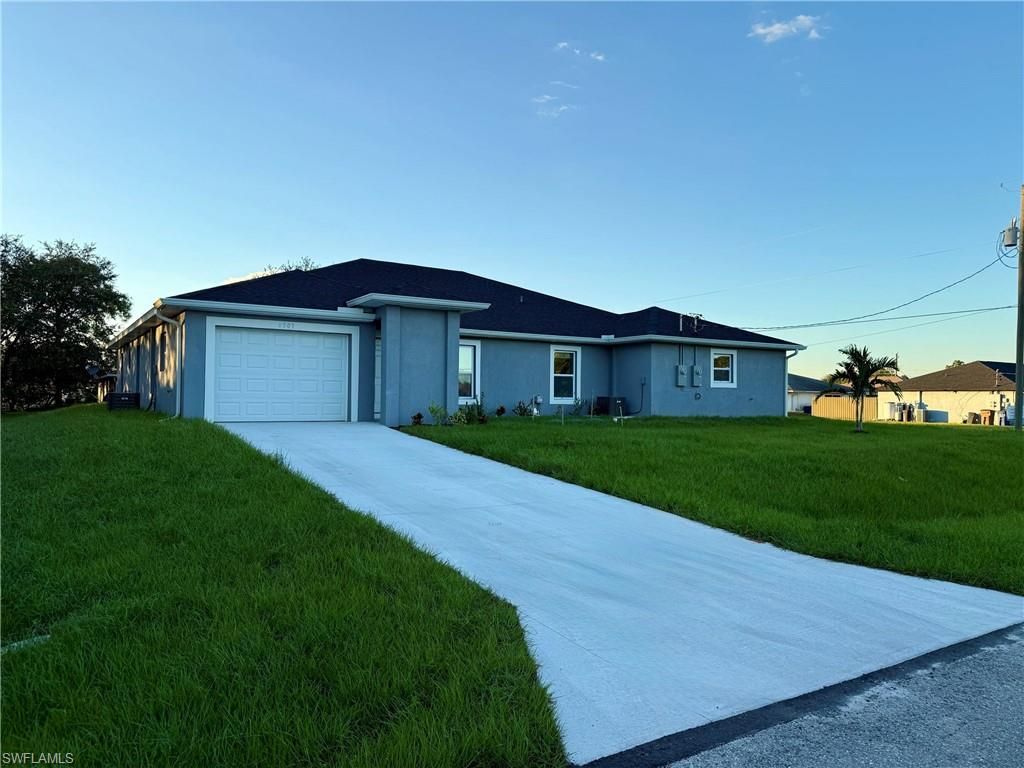 701-703 Gordon AVE S, LEHIGH ACRES, FL 33973 — exterior