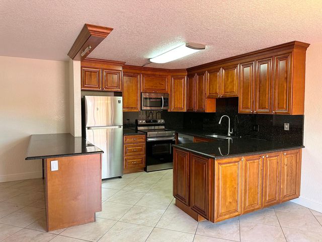 416 Arabian Road, Palm Springs, FL 33461