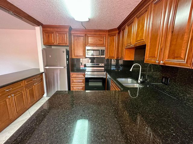 416 Arabian Road, Palm Springs, FL 33461