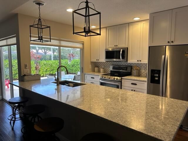 9701 Chapman Oak Court, Palm Beach Gardens, FL 33410