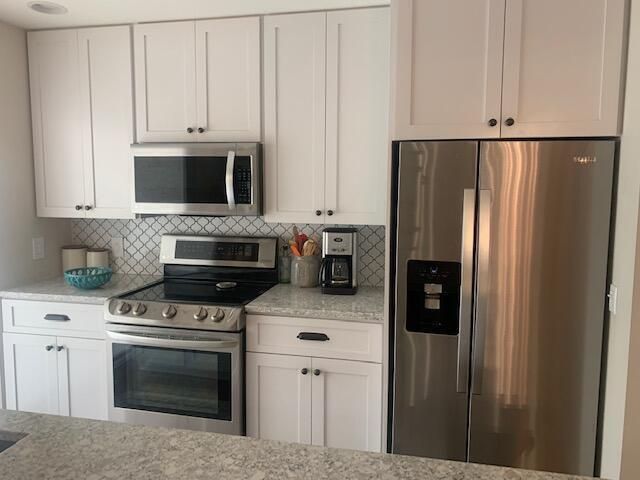 9701 Chapman Oak Court, Palm Beach Gardens, FL 33410