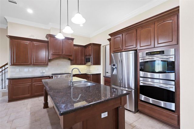 6311 Redfish Reef Drive, Beach City, TX 77523