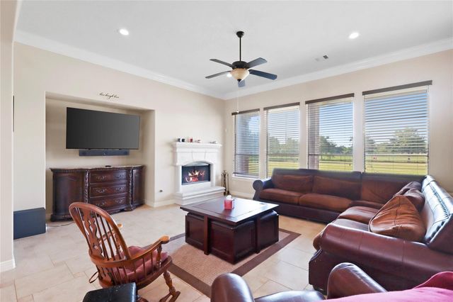 6311 Redfish Reef Drive, Beach City, TX 77523