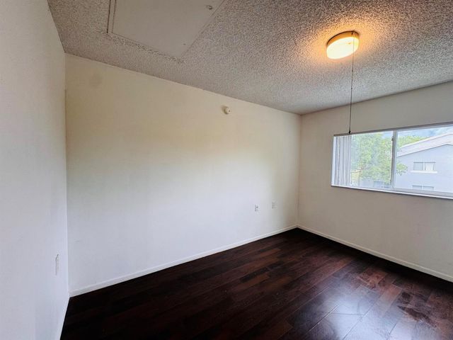 1068 N BENOIST FARMS Road 302, West Palm Beach, FL 33411
