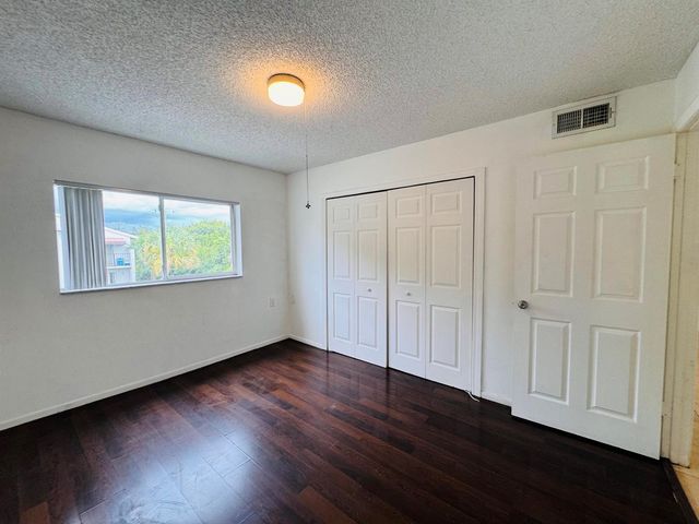 1068 N BENOIST FARMS Road 302, West Palm Beach, FL 33411