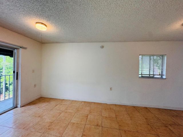1068 N BENOIST FARMS Road 302, West Palm Beach, FL 33411