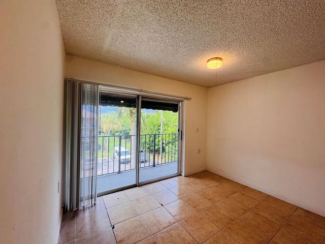 1068 N BENOIST FARMS Road 302, West Palm Beach, FL 33411