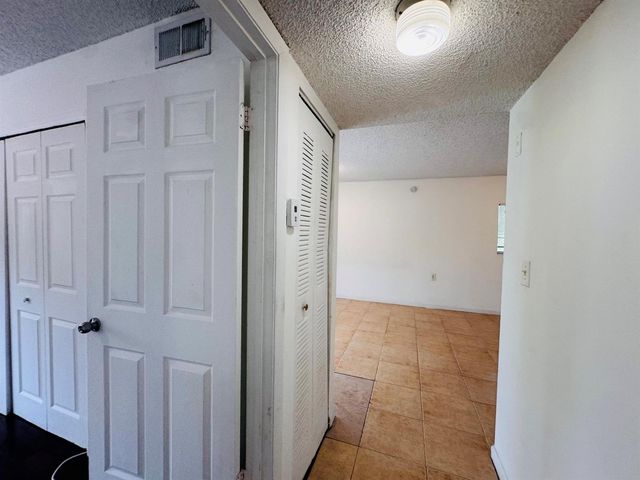 1068 N BENOIST FARMS Road 302, West Palm Beach, FL 33411