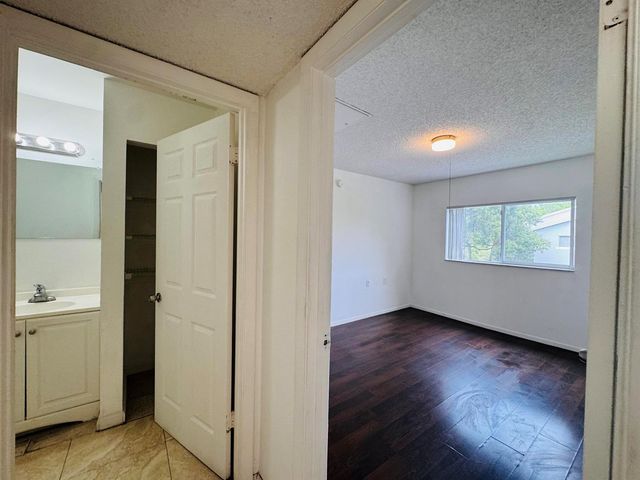 1068 N BENOIST FARMS Road 302, West Palm Beach, FL 33411