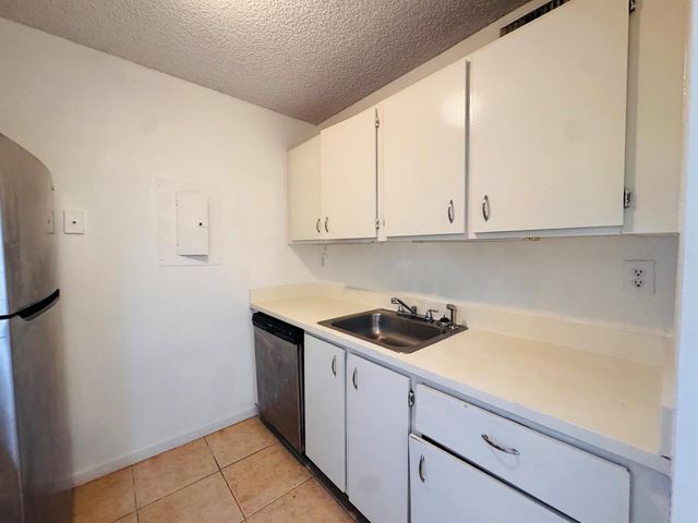 1068 N BENOIST FARMS Road 302, West Palm Beach, FL 33411
