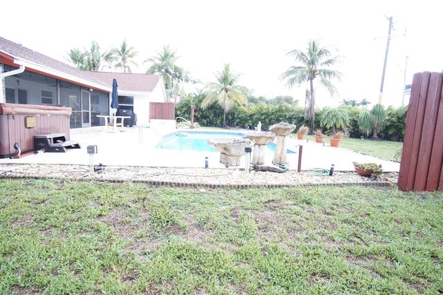 7561 Nemec Drive N, Lake Clarke Shores, FL 33406