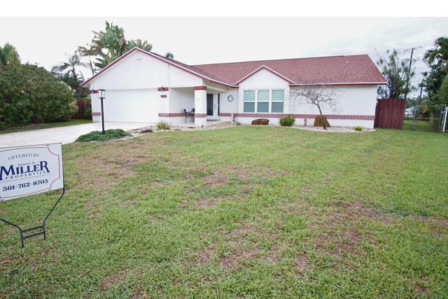 7561 Nemec Drive N, Lake Clarke Shores, FL 33406