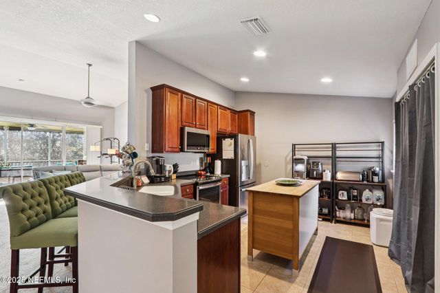 6604 WHITE BLOSSOM Court 10H, Jacksonville, FL 32258