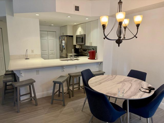 3018 Alcazar Place 101, Palm Beach Gardens, FL 33410