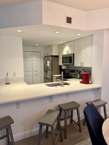 3018 Alcazar Place 101, Palm Beach Gardens, FL 33410