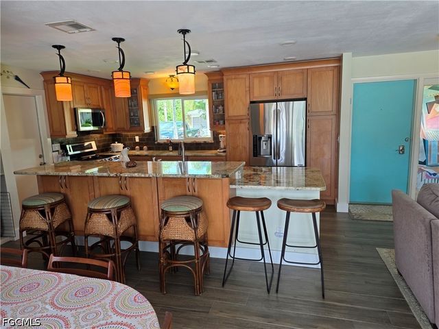130 SW 58th ST, Cape Coral, FL 33914