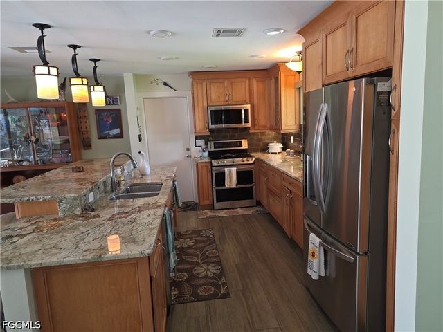 130 SW 58th ST, Cape Coral, FL 33914