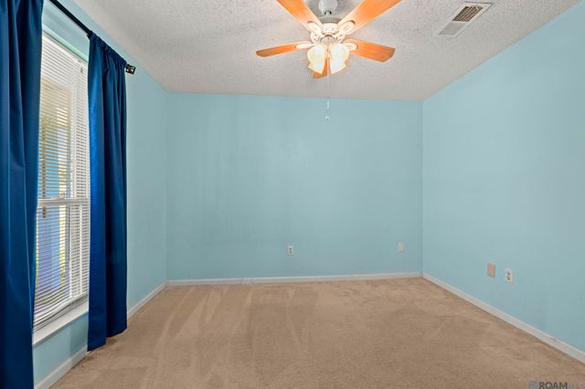 10003 E Brookside Dr, Central, LA 70818