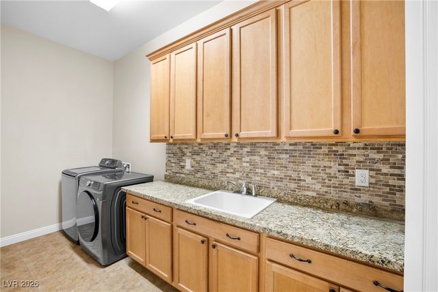 9729 Rock Partridge Court, Las Vegas, NV 89149