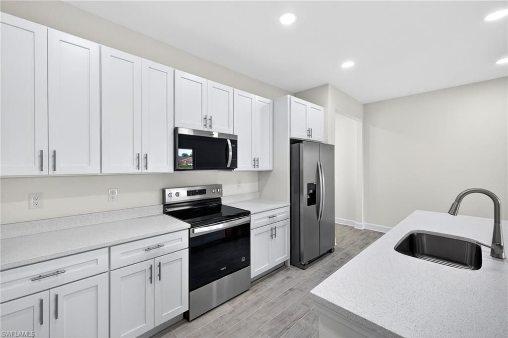 Image 2 of property listing at 529 NW 23rd ST, Cape Coral, FL 33993
