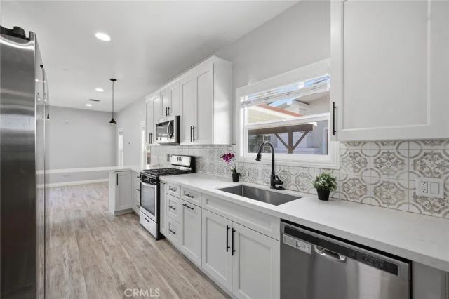 4167 Denker, Los Angeles, CA 90062