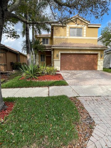 584 Conservation Drive, Weston, FL 33327