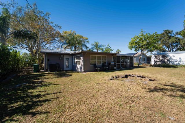 477 SE Asbury Lane, Port St. Lucie, FL 34983