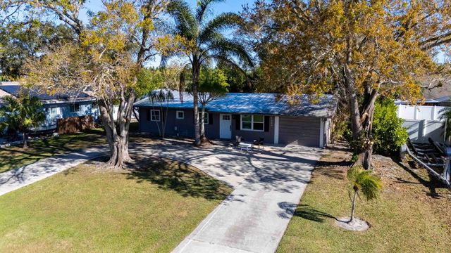 477 SE Asbury Lane, Port St. Lucie, FL 34983