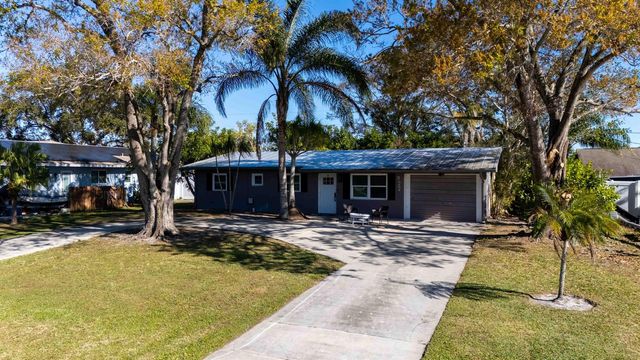 477 SE Asbury Lane, Port St. Lucie, FL 34983