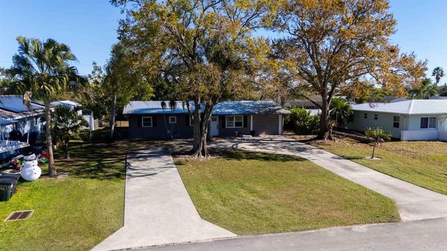 477 SE Asbury Lane, Port St. Lucie, FL 34983