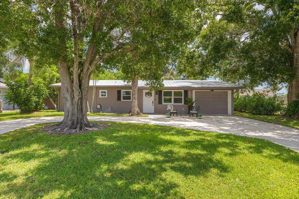477 SE Asbury Lane, Port St. Lucie, FL 34983