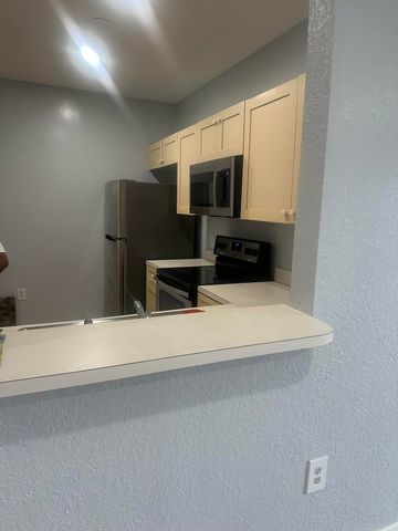 1049 Golden Lakes Boulevard 122, West Palm Beach, FL 33411
