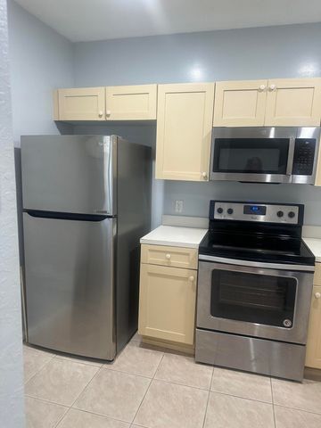 1049 Golden Lakes Boulevard 122, West Palm Beach, FL 33411