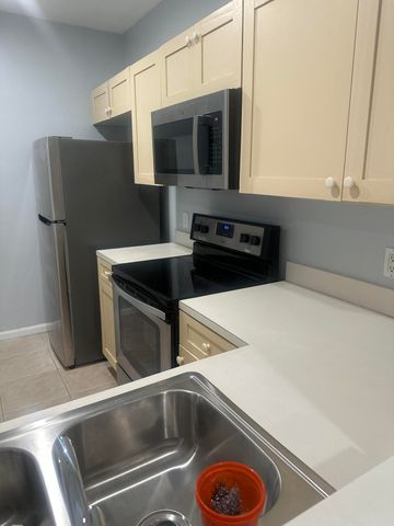 1049 Golden Lakes Boulevard 122, West Palm Beach, FL 33411