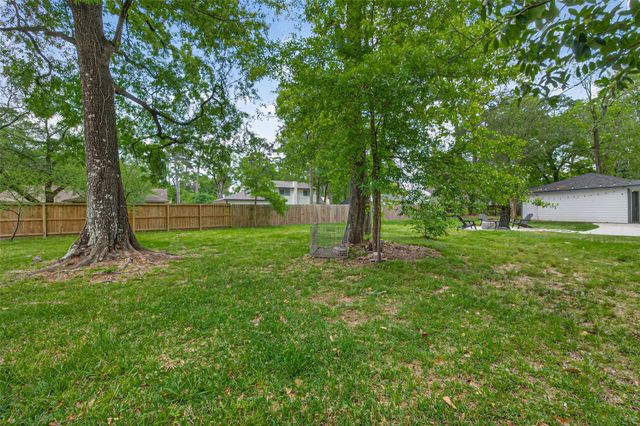 2127 Whispering Trails Circle, Kingwood, TX 77339