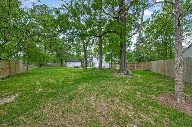 2127 Whispering Trails Circle, Kingwood, TX 77339