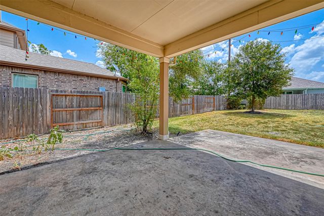 8707 Cimarron Falls Court, Magnolia, TX 77354