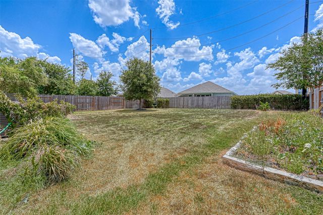 8707 Cimarron Falls Court, Magnolia, TX 77354