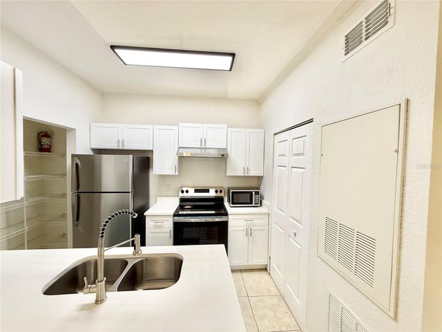 2674 ROBERT TRENT JONES DRIVE 312, Orlando, FL 32835